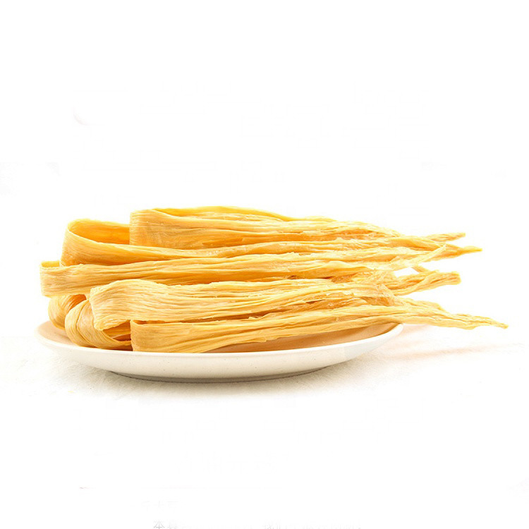 Giallo brillante Yuba Tofu secco Proteine della pelle Fibra Alimenti vegetariani Immersione in acqua 30 minuti Pre cottura